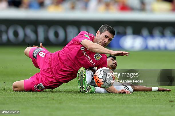 Nick Montomgery of the Mariners collides with Roy Krishna of the Phoenix during the round five A-League match between the Central Coast Mariners and...