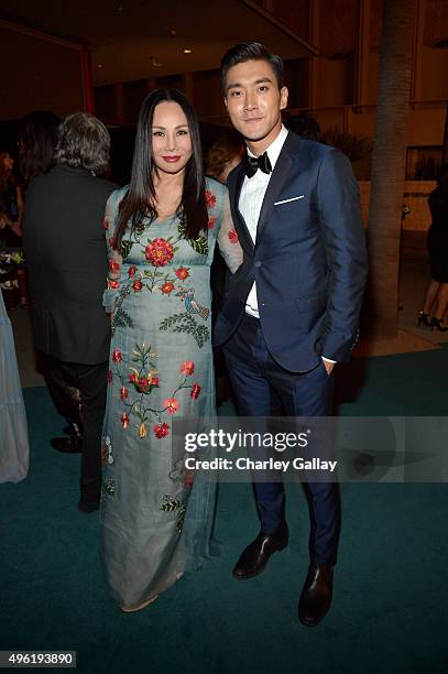 Art Film Gala co-chair and LACMA Trustee Eva Chow, wearing Gucci, and singer Choi Siwon attend LACMA 2015 Art+Film Gala Honoring James Turrell and...