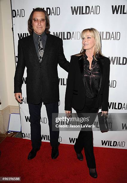 Actor John Corbett and actress Bo Derek attend WildAid 2015 at Montage Hotel on November 7, 2015 in Beverly Hills, California.