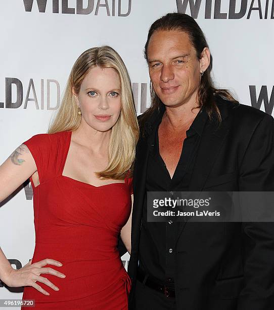 Actress Kristin Bauer van Straten and husband Abri van Straten attend WildAid 2015 at Montage Hotel on November 7, 2015 in Beverly Hills, California.