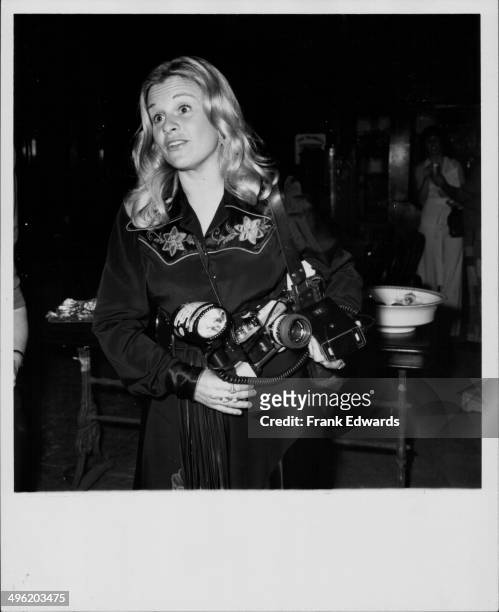 Heiress Francesca Hilton, working as a Hollywood photographer at the 'Actors and Others for Animals' charity benefit, Los Angeles, circa 1970-1980.