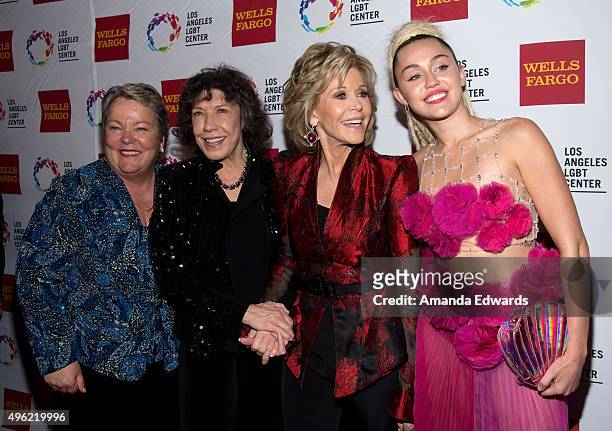 Los Angeles LGBT Center CEO Lorri L. Jean, actresses Lily Tomlin and Jane Fonda and singer Miley Cyrus arrive at the 46th Anniversary Gala Vanguard...