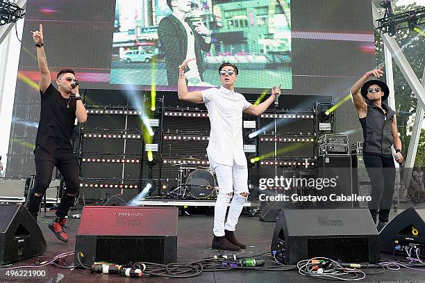 Monti Montanez, Nesty Galguera, and Leo Herrera of Grupo Treo perform onstage at the iHeartRadio Fiesta Latina pre-show presented by Sprint at...