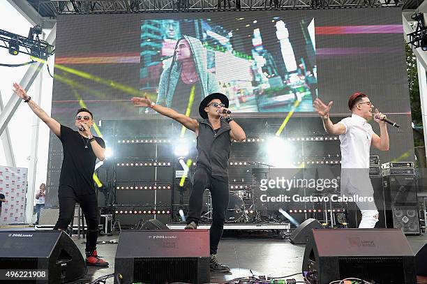 Monti Montanez, Leo Herrera, and Nesty Galguera of Grupo Treo perform onstage at the iHeartRadio Fiesta Latina pre-show presented by Sprint at...