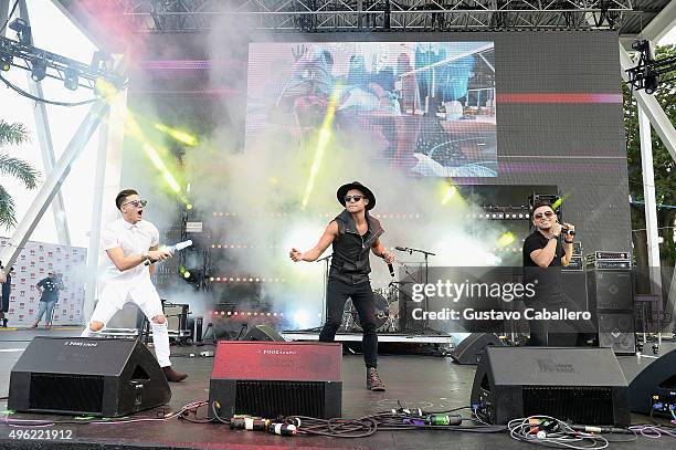 Nesty Galguera, Leo Herrera, and Monti Montanez of Grupo Treo perform onstage at the iHeartRadio Fiesta Latina pre-show presented by Sprint at...