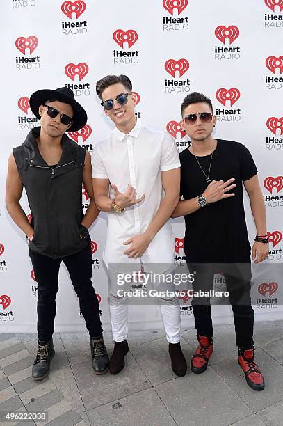 Leo Herrera, Nesty Galguera, and Monti Montanez of Grupo Treo pose at the iHeartRadio Fiesta Latina pre-show presented by Sprint at Bayfront Park...