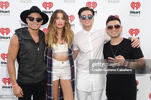 Leo Herrera, Sofia Reyes, Nesty Galguera, and Monti Montanez pose at the iHeartRadio Fiesta Latina pre-show presented by Sprint at Bayfront Park...