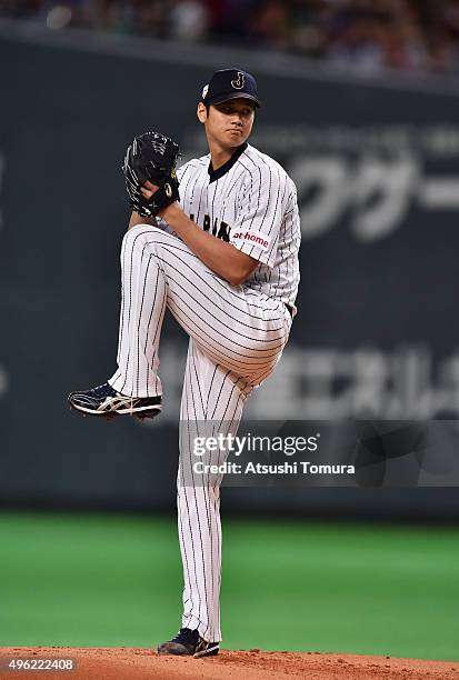 Starting pitcher Shohei Otani throws in the top of first inning during the WBSC Premier 12 match between Japan and South Korea at the Sapporo Dome on...