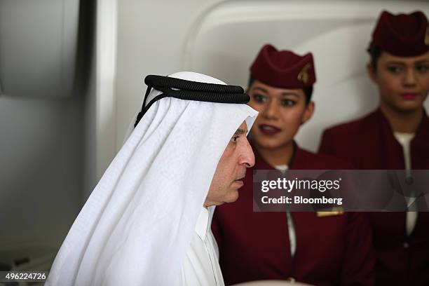 Akbar Al Baker, chief executive officer of Qatar Airways Ltd., arrives for an interview aboard a Boeing Co. 787 Dreamliner aircraft on the opening...