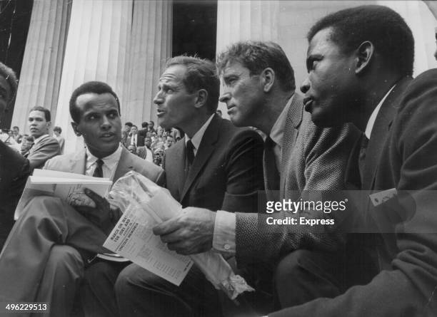 Actors Harry Belafonte, Charlton Heston, Burt Lancaster and Sidney Poitier attending the March on Washington for Jobs and Freedom, a huge civil...
