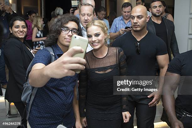 Margot Robbie takes a selfie photos as she attends British Airways celebration of the launch of its new Boing 787-9 Dreamliner on its daily...