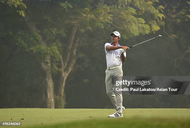 Jyoti Randhawa of India plays a shot during round four of the Panasonic Open India at Delhi Golf Club on November 8, 2015 in New Delhi, India.