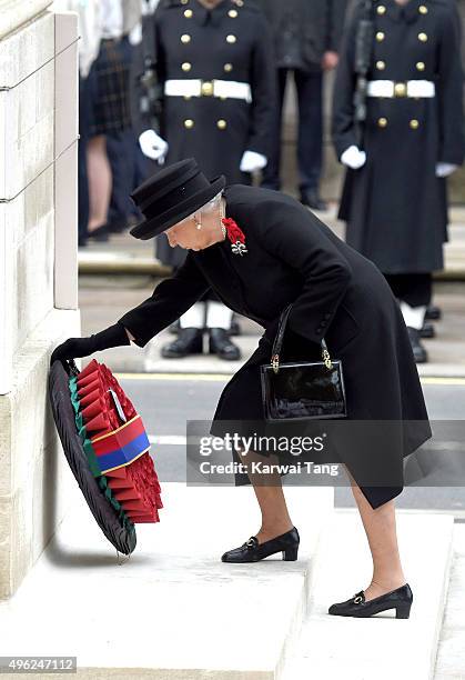 Queen Elizabeth II lays a wreath during the annual Remembrance Sunday Service at the Cenotaph, Whitehall on November 8, 2015 in London, England.