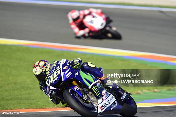 Movistar Yamaha's Italian rider Valentino Rossi rides during the MotoGP motorcycling race at the Valencia Grand Prix at Ricardo Tormo racetrack in...
