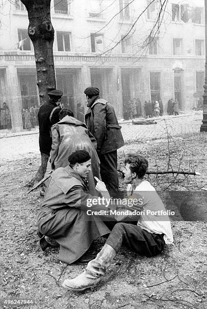 Member of the Hungarian secret police has been captured by the enraged crowd during the revolt of the Hungarian people against the Soviet tyranny....