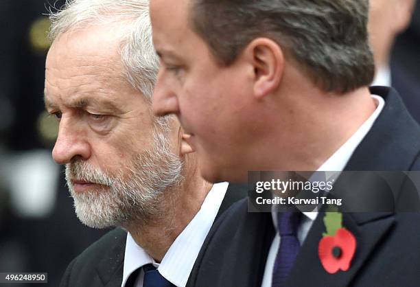 Jeremy Corbyn and David Cameron attend the annual Remembrance Sunday Service at the Cenotaph, Whitehall on November 8, 2015 in London, England.