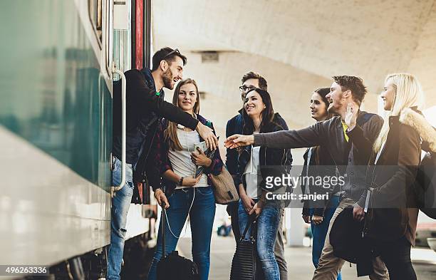 teenagers on the railway station - catching train stock pictures, royalty-free photos & images