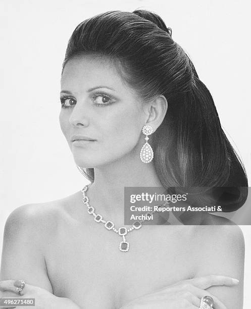 Close-up of Italian actress Claudia Cardinale. A Bulgari ring on her right hand. Photocall. Jewels. Rome , January 1970