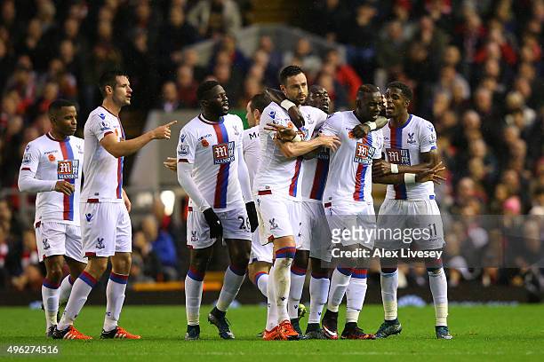 Yannick Bolasie of Crystal Palace celebrates with his team mates after scoring the opening goal during the Barclays Premier League match between...