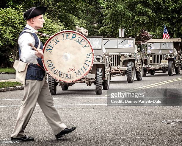 Drummer and Jeeps during Memorial Day parade