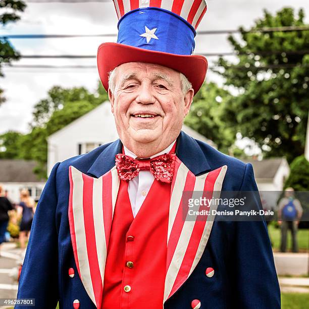 Mayor if Morris Plains, New Jersey heading up annual Memorial Day parade dressed as Uncle Sam.