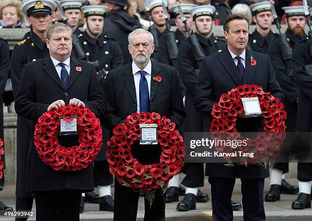 Scottish National Party's Parliamentary Group Leader Angus Robertson, Labour leader Jeremy Corbyn and British Prime Minister David Cameron attend the...