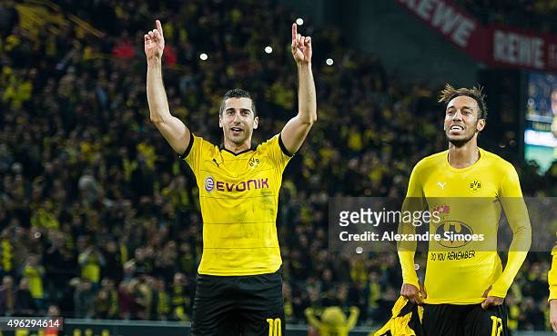 Pierre-Emerick Aubameyang and Henrikh Mkhitaryan of Borussia Dortmund celebrates the win after the final whistle during the Bundesliga match between...
