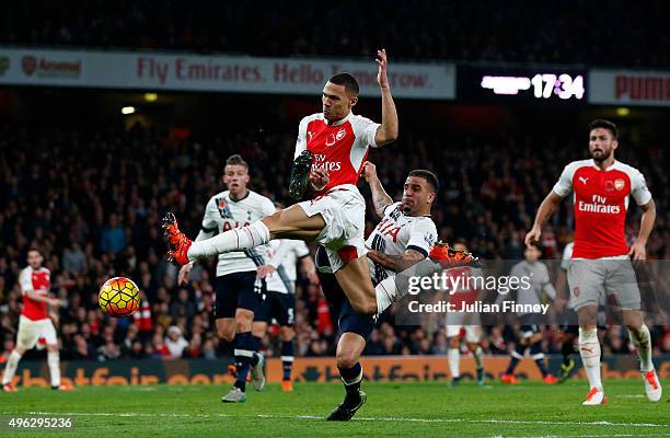 Kieran Gibbs of Arsenal scores his side's first goal during the Barclays Premier League match between Arsenal and Tottenham Hotspur at the Emirates...