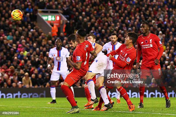 Scott Dann of Crystal Palace scores his side's second goal during the Barclays Premier League match between Liverpool and Crystal Palace at Anfield...