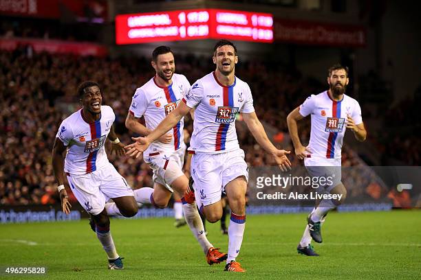 Scott Dann of Crystal Palace celebrates scoring his side's second goal during the Barclays Premier League match between Liverpool and Crystal Palace...
