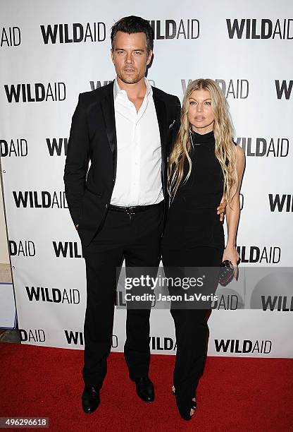 Josh Duhamel and Fergie attend WildAid 2015 at Montage Hotel on November 7, 2015 in Beverly Hills, California.