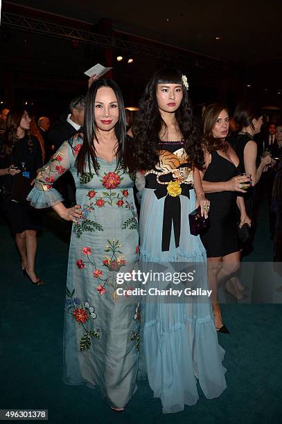 Art Film Gala co-chair and LACMA Trustee Eva Chow , wearing Gucci, and musician Asia Chow attend LACMA 2015 Art+Film Gala Honoring James Turrell and...