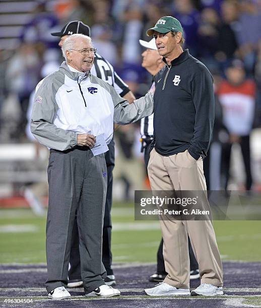 Head coach Bill Snyder of the Kansas State Wildcats talks with head coach Art Briles of the Baylor Bears prior to the game on November 5, 2015 at...