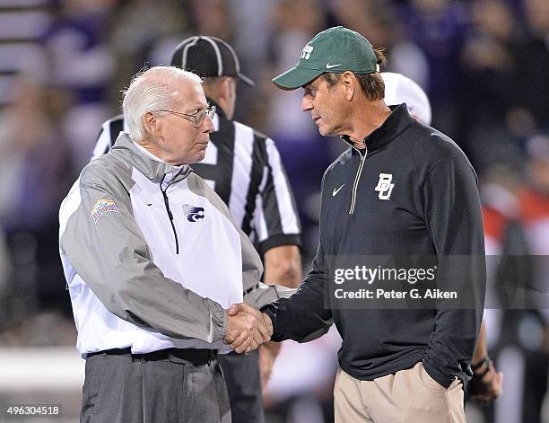 Head coach Bill Snyder of the Kansas State Wildcats shakes hands with head coach Art Briles of the Baylor Bears prior to the game on November 5, 2015...