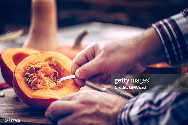 preparing and cutting fresh pumpkins - hokaido pumpkin stock pictures, royalty-free photos & images