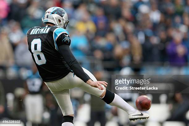 Brad Nortman of the Carolina Panthers punts the ball against the Green Bay Packers in the 4th quarter during their game at Bank of America Stadium on...