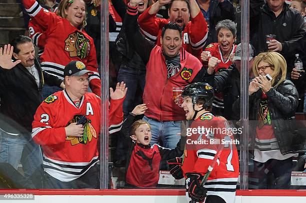 Artemi Panarin of the Chicago Blackhawks reacts after scoring in the first period of the NHL game against the Edmonton Oilers at the United Center on...