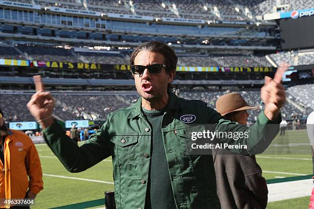 Bobby Cannavale works on his "J-E-T-S!" chant when he attends the New York Jets vs Jacksonville Jaguars game at MetLife Stadium on November 8, 2015...