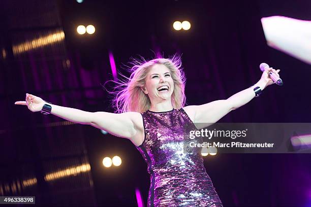 Beatrice Egli performs onstage during the 'Schlager-Starparade' at the Koenig-Pilsener-Arena on November 8, 2015 in Oberhausen, Germany.