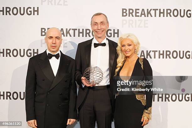 Yuri Milner, Director, Max Planck Institute for Evolutionary Anthropology, Svante Paabo posing with the 2016 Breakthrough Prize in Life Sciences, and...