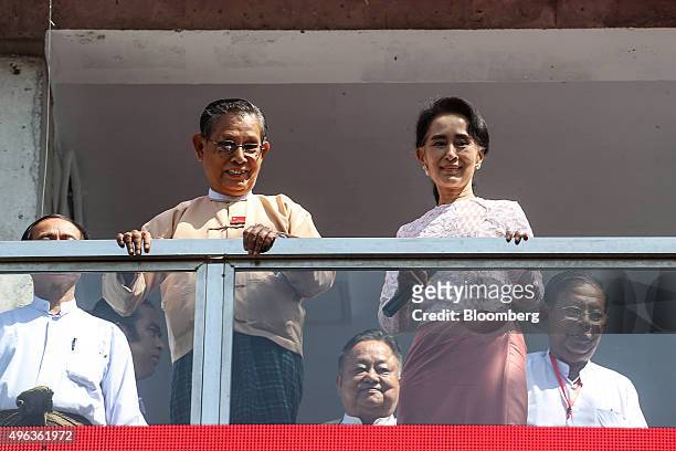 Aung San Suu Kyi, Myanmar's opposition leader and chairperson of the National League for Democracy , right, and Tin Oo, co-founder of the NLD, stand...