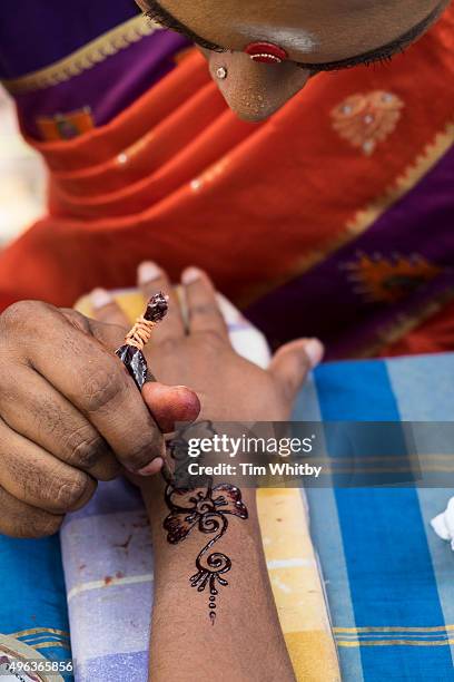 Henna designs are applied to the Indian community ahead of Deepavali also known as Diwali, the Festival of Lights in Brickfields, known as Little...