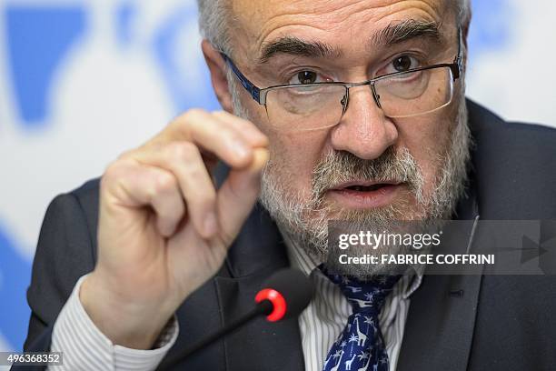 Secretary-General of the World Meteorological Organization Michel Jarraud shows the new WMO Greenhouse Gas Bulletin during a press conference of the...