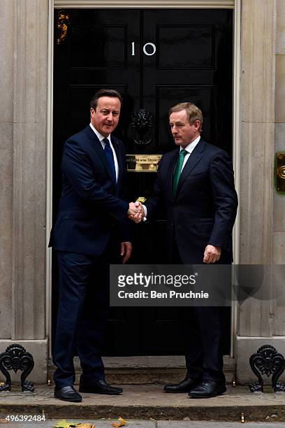 British Prime Minister David Cameron greets Ireland's Taoiseach Enda Kenny at Downing Street on November 9, 2015 in London, England. The head of...