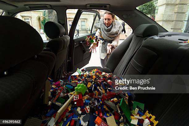 Donations of Lego bricks are left in a BMW 5 series sedan as part of Chinese artist Ai Weiweis' appeal for lego bricks at The Royal Academy of Arts...