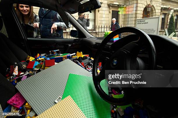 Donations of Lego bricks are left in a BMW 5 series sedan as part of Chinese artist Ai Weiweis' appeal for lego bricks at The Royal Academy of Arts...