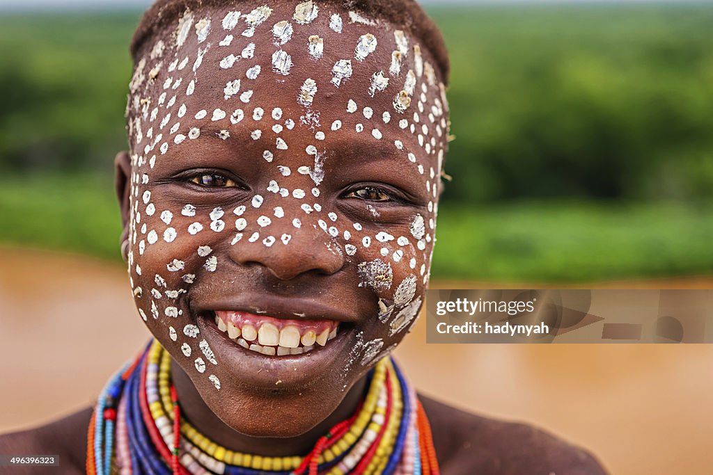 Portrait of young girl from Karo tribe, Ethiopia, Africa