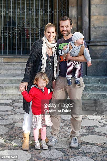 Sophie Schuett, her children Shaza Maria Schuett and Lonzo Henry Schuett and her partner Felix Seitz pose during a family photo session September 27,...
