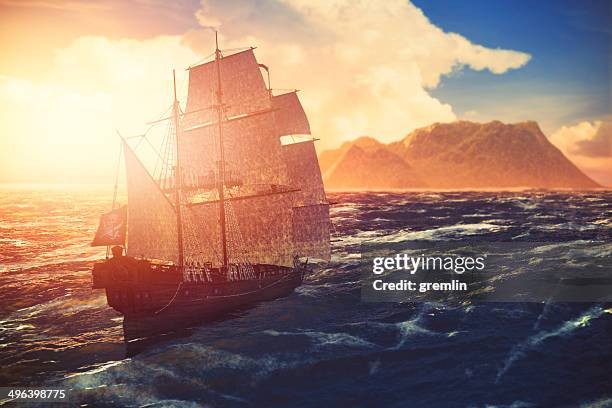piratenschiff segeln richtung, einsame insel bei sonnenuntergang - pirate stock-fotos und bilder