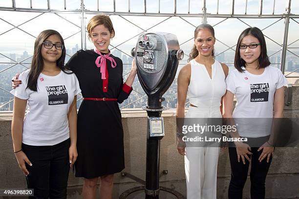 Ballerina Misty Copeland and Glamour magazine editor in chief Cindi Leive light the Empire State Building with Cynthia Ung and Tasnim Nahar of the...